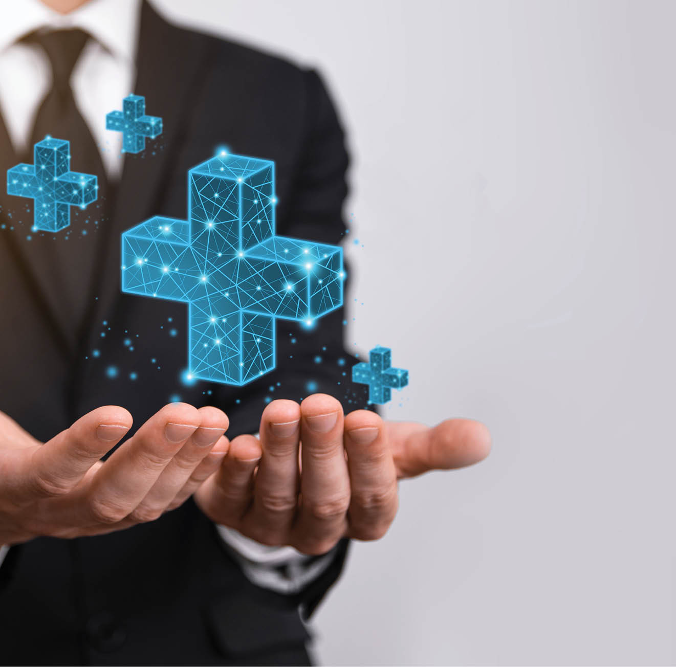 Businessman hand holding 3D plus low polygonal icon.Plus sign virtual means to offer positive thing like benefits, personal development, social network Profit,health insurance, growth concepts