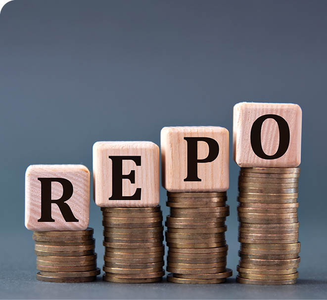 REPO (Repurchase Agreement) - word on wooden cubes on coins on a gray background. Business concept